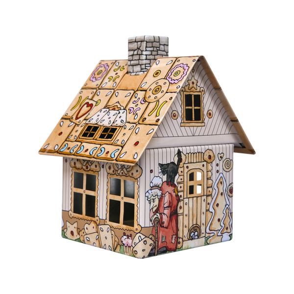 Das Räucherhäuschen Hänsel & Gretel von Original Crottendorfer Räucherkerzen ist ein farbenfrohes Lebkuchenhaus mit Ziegeldach, aufwendigen Mustern und einem Schornstein. An der Seite steht eine Figur mit einem Lamm, ergänzt durch dekorative Bäume und Herzen entlang der Wände.