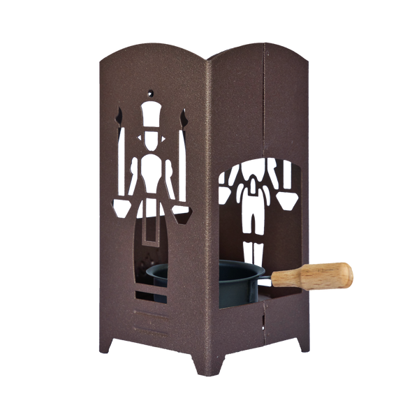 Die Räucherlaterne „Bergmann/Engel“ aus braunem Metall von Original Crottendorfer Räucherkerzen zeigt ausgeschnittene Silhouetten von Kerzen haltenden Figuren und enthält einen kleinen schwarzen Topf mit Holzgriff, ideal als markanter Räucherkerzenhalter.