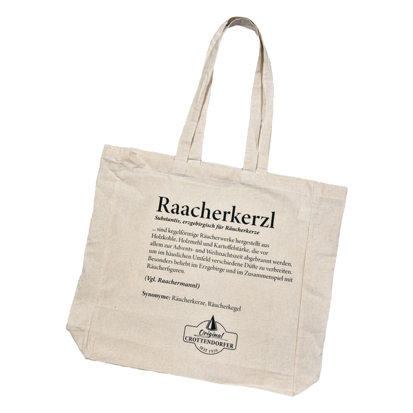 Beiger Stoffbeutel „Raacherkerzl Definition“ von Original Crottendorfer mit schwarzem Text, Definition und Synonymen des Wortes Raacherkerzl sowie dem Markenlogo auf der Vorderseite.