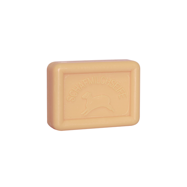 Eine rechteckige Schafmilchseife Hanföl-Seife von Ovis, in hellem Beige, mit der Aufschrift „SCHAFMILCHSEIFE“ und einem Schaf als Prägung in der Mitte. Hergestellt aus natürlichen Inhaltsstoffen sorgt es für eine sanfte Hautpflege.