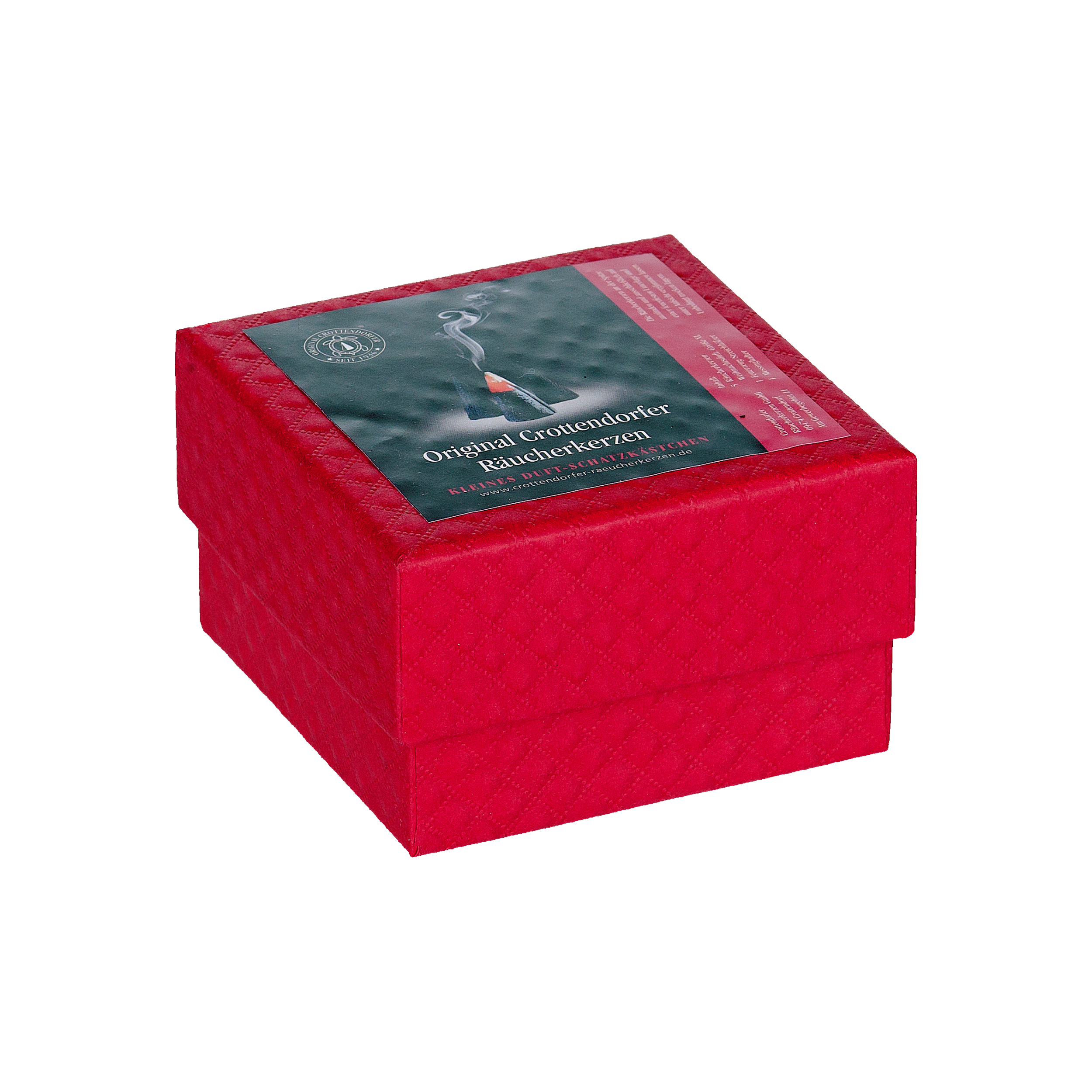 Die Geschenkbox „Riesen“ von Original Crottendorfer Räucherkerzen ist eine rote, quadratische Geschenkbox mit Deckel. Ein grünes Etikett mit Rauch und deutschem Text deutet darauf hin, dass sie Räucherkerzen enthält, die sich ideal für festliche Weihnachtsdüfte eignen.