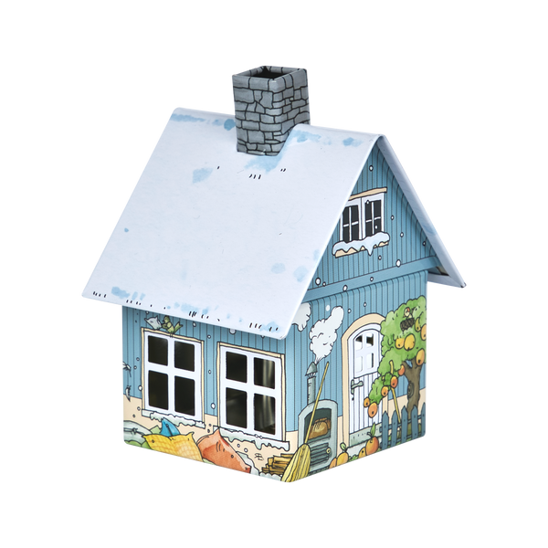 Das Räucherhäuschen Frau Holle von Original Crottendorfer Räucherkerzen ist ein charmantes Deko-Haus mit blauer Außenfassade und weißem Dach, handgezeichneten Illustrationen von Fenstern, einem Apfelbaum, einem Lattenzaun, Gartengeräten und einem grauen gemauerten Schornstein obendrauf.