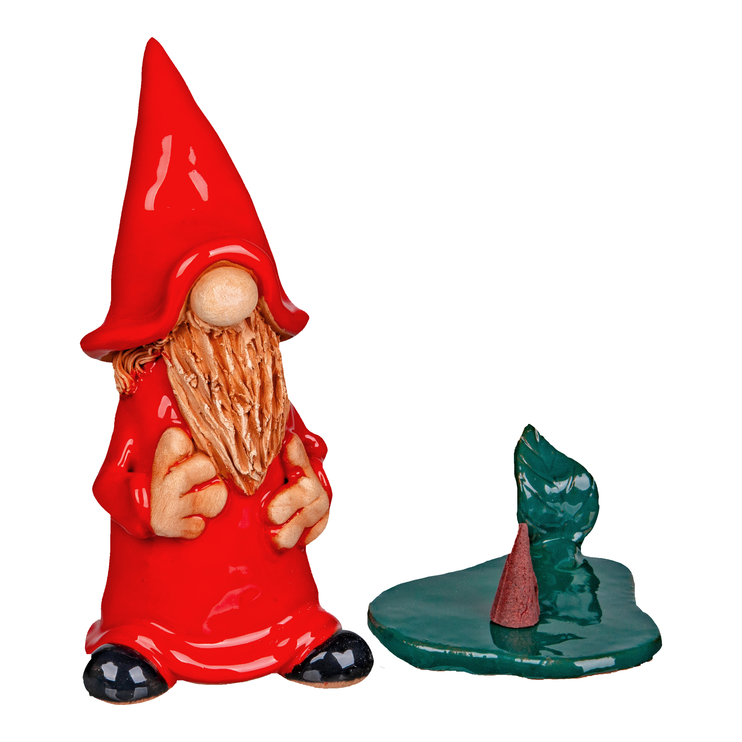 Die Keramik-Räucherfigur Wichtel – rot von Original Crottendorfer Räucherkerzen zeigt einen charmanten, langbärtigen Gnom mit rotem Hut und Umhang, begleitet von einer kleinen grünen Plattform mit einem schrägen roten Kegel vor einem tiefschwarzen Hintergrund.