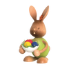 Der Stupsi Hase mit Eierschale von Drechslerei Kuhnert ist eine Holzfigur mit grünem Körper und einer Schale mit bunten Ostereiern. Er hat eine Blume am Ohr, einen fröhlichen Gesichtsausdruck und zeigt feine Handwerkskunst.
