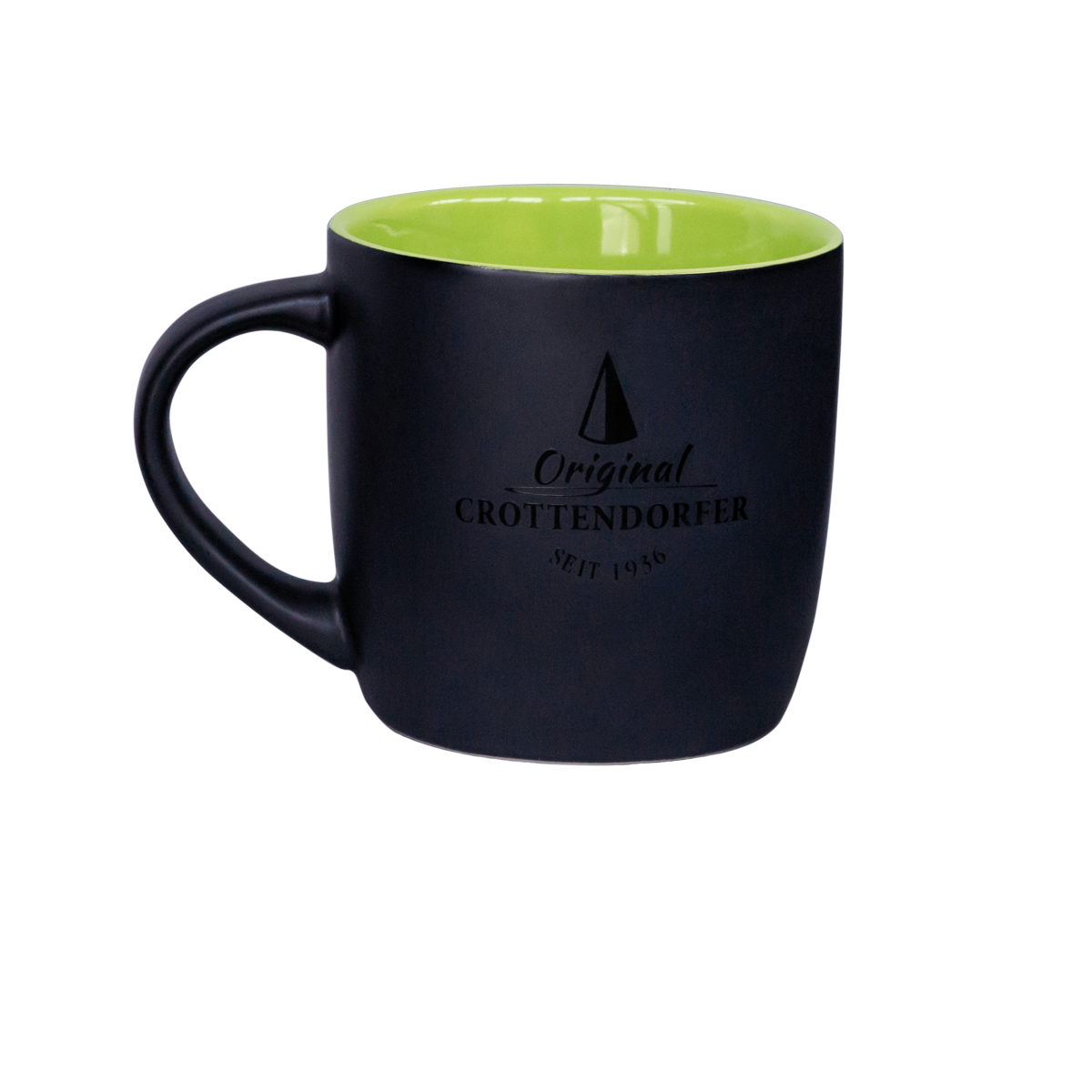 Die Keramiktasse matt hellgrün/schwarz von Original Crottendorfer Räucherkerzen hat eine spülmaschinenfeste mattschwarze Außenseite, eine hellgrüne Innenseite und zeigt elegant „Original Crottendorfer seit 1946“ mit einem dreieckigen Logo an der Seite.