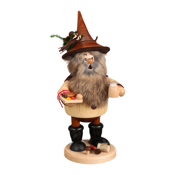 Der handgefertigte Wichtel Bockwurstfreund von DWU Drechselwerkstatt Uhlig ist eine skurrile Holzfigur aus dem Erzgebirge, die einen bärtigen Räuchermann mit spitzem Hut und Grünzeug darstellt und eine Schale mit kleinen Gegenständen hält. Er steht kräftig in schwarzen Stiefeln und hat einen Baumstamm und eine Eichel zu seinen Füßen.