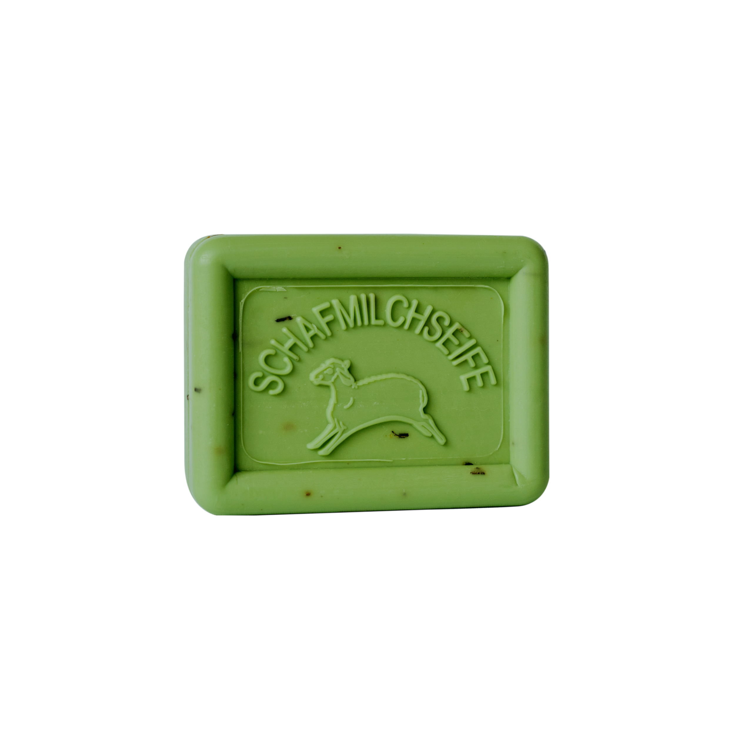 Eine grüne, rechteckige Tafel Ovis Schafmilchseife Kräutersalbe mit der Gravur eines bezaubernden Schafs und dem Wort „Schafmilchseife“ ruht elegant auf schwarzem Hintergrund und verspricht, Ihre Haut mit seiner hautpflegenden Formel zu verwöhnen.