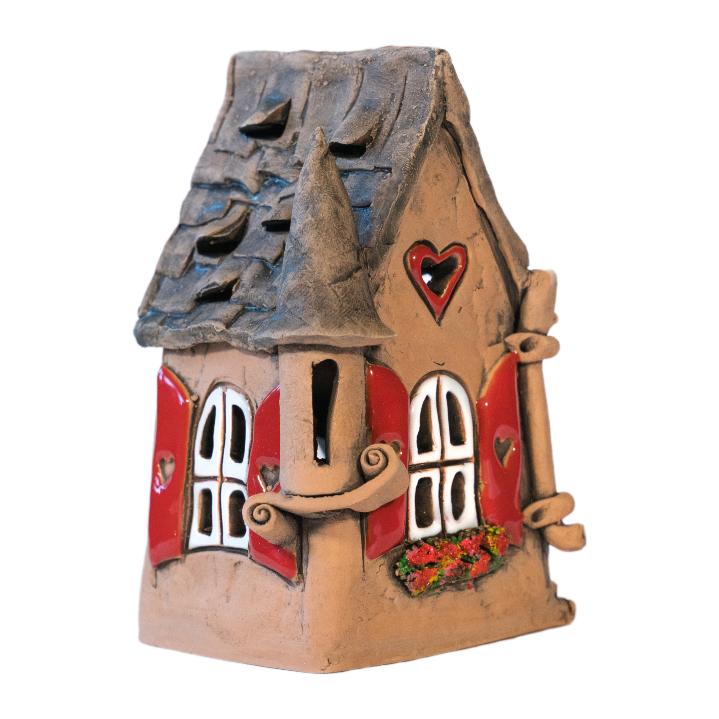 Das „Räucherhaus Keramik mit Herz“ von Original Crottendorfer ist ein skurriles, dekoratives Keramikhaus mit hohem, spitzem Dach, roten Fensterläden und herzförmigen Verzierungen. Es besticht durch eine strukturierte, erdige Oberfläche mit floralen Details an den Fenstern und ist nur in begrenzter Stückzahl erhältlich.