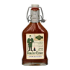 Das Original Crottendorfer Räucher-Elixier, in der 0,2l Bügelflasche mit Metallverschlussdeckel, enthält eine braune Flüssigkeit. Das Etikett zeigt einen Mann in Grün mit Pfeife und die Aufschrift „Großmutters Original-Rezeptur“, die einem handwerklich hergestellten Kräuterlikör mit 35 % Vol. ähnelt.