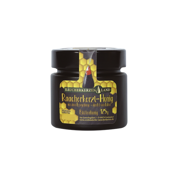 Ein 125g schwarzes Glas Original Crottendorfer Raacherkerzl-Honig zeichnet sich durch ein Wabenmuster, eine Bienenillustration, einen deutschen Text, einen schwarzen Deckel und seine antibakterielle Wirkung aus. Dieser Blütenhonig stammt aus dem Erzgebirge.