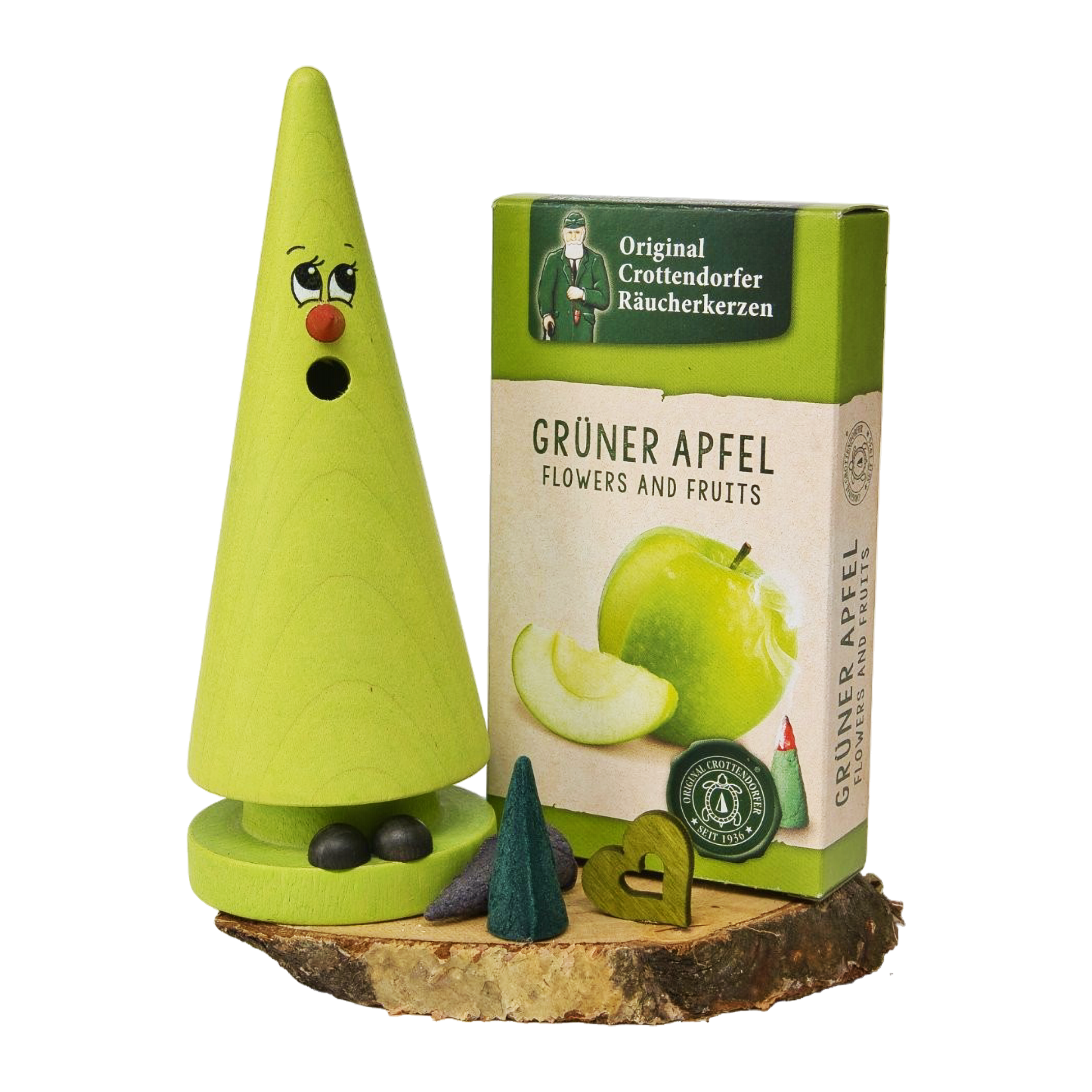 Das Geschenkset „Ziegenbein + Räucherkerzen“ von Original Crottendorfer Räucherkerzen besteht aus einem grünen, kegelförmigen Ziegenbein-Räucherkerzenhalter mit Holzsockel, ergänzt durch Räucherkegel und ein Miniaturhäuschen, die zusammen eine bezaubernde Dekoration bilden.