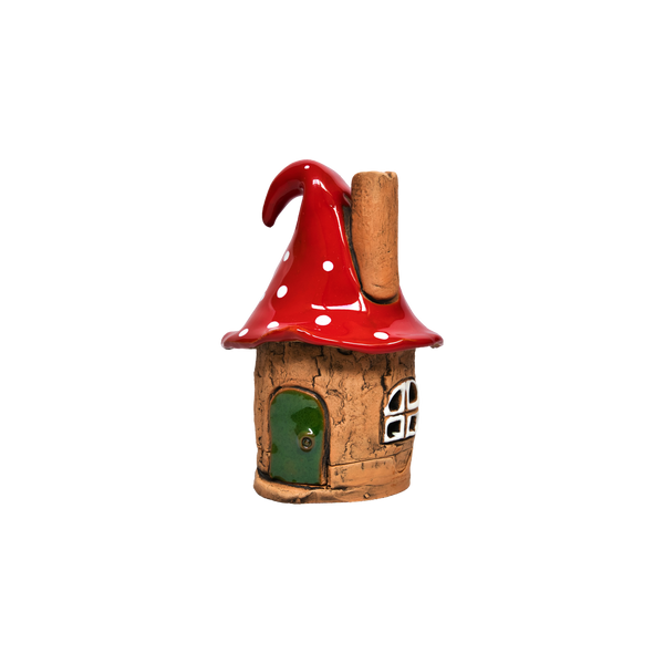 Die Original Crottendorfer Räucherhaus Keramik Zipfelmütze ist ein kleines, liebevoll gefertigtes Keramik-Räucherhaus in Form eines Pilzes mit rot gefleckter Kappe, grüner Tür, Schornstein und weiß gerahmten Fenstern auf schlichtem weißem Grund.