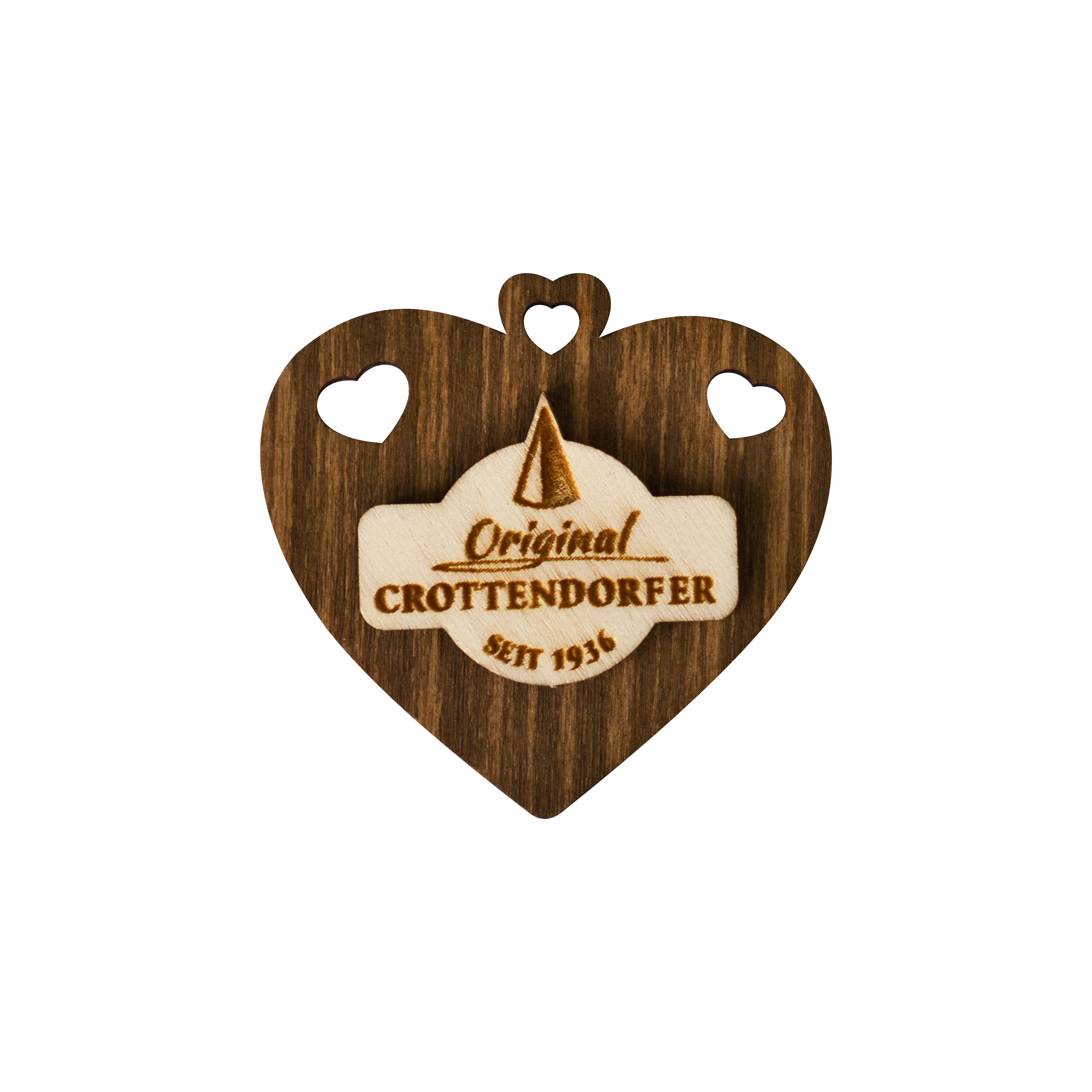 Der Crottendorfer Magnet aus Holz von Original Crottendorfer ist ein hölzernes Herz mit zwei kleinen Herzausschnitten, dem Crottendorfer Logo und dem Schriftzug 
