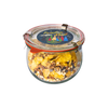 Glasgefäß mit rotem Siegel und Metallverschluss, gefüllt mit Original Crottendorfer Hausgemachtes Müsli 200 g - veganes Müsli mit Cornflakes, Haferflocken und Trockenfrüchten. Auf dem Deckel befindet sich ein buntes Familien Müsli Etikett.