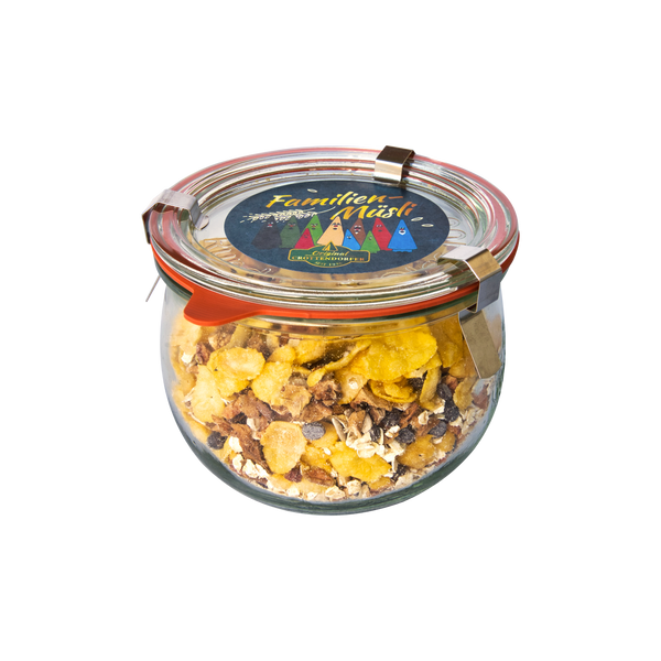 Glasgefäß mit rotem Siegel und Metallverschluss, gefüllt mit Original Crottendorfer Hausgemachtes Müsli 200 g - veganes Müsli mit Cornflakes, Haferflocken und Trockenfrüchten. Auf dem Deckel befindet sich ein buntes Familien Müsli Etikett.