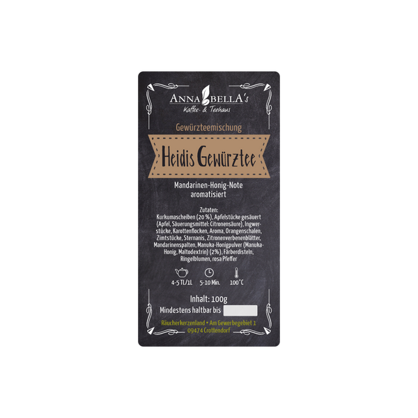 Ein schwarzes Tee-Etikett mit weißer Schrift lautet Original Crottendorfer Gewürzteemischung "Heidis Gewürztee", nennt als Zutaten Kurkuma, Ingwer, Zimt, 100g Gewicht, deutsche Brau-/Herkunftsangabe und zeigt ein braunes Banner mit dekorativen Elementen.