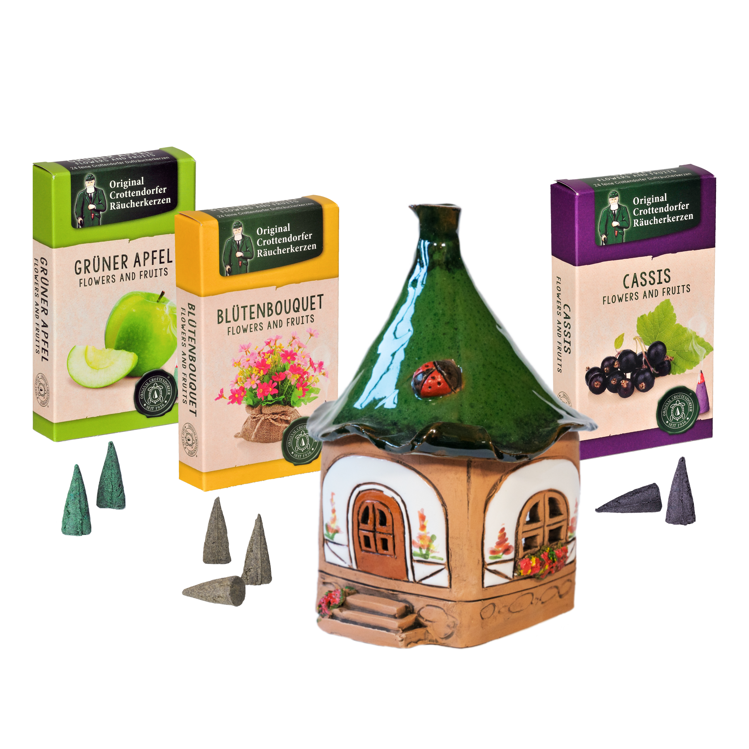 Das Original Crottendorfer Räucherhaus aus Keramik, inklusive 3 Packungen Räucherkerzen, ist eine schöne Weihnachtsdekoration, verziert mit Blumen- und Fruchtmotiven und Düften wie Grüner Apfel, Blütenbouquet und Cassis.