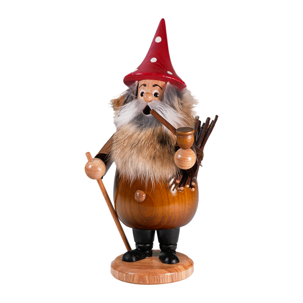 Der Wurzelzwerg braun Hut rot der DWU Drechselwerkstatt Uhlig ist ein Räuchermännchen aus Holz: ein bärtiger Mann mit rotem Spitzhut, Pelzkragen, Stäbchenbündel, Pfeife im Mund und rundem Sockel - ein charmantes Stück erzgebirgischer Volkskunst.