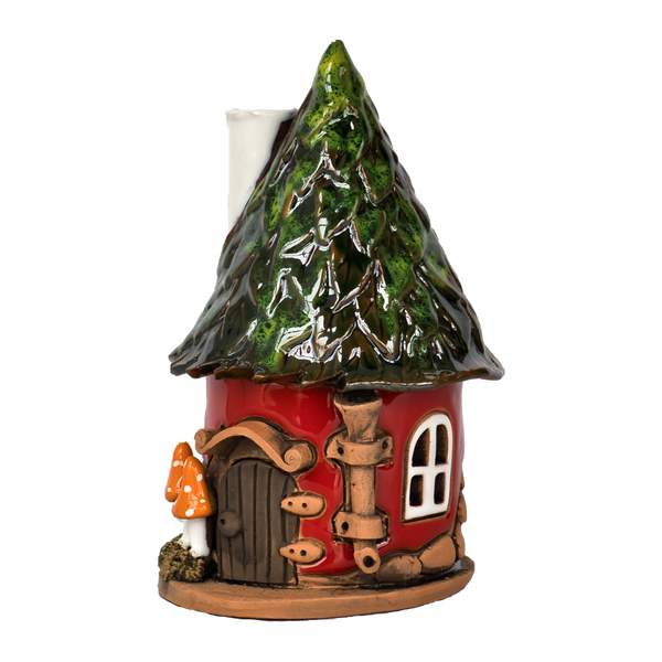 Das "Räucherhaus Keramik Pilzhaus rot" von Original Crottendorfer ist liebevoll gestaltet: ein roter Keramikpilz mit grünem Dach, weißen Fenstern, brauner Tür und kleinem orangenem Pilz am Eingang - ideal für deinen Messingteller!.